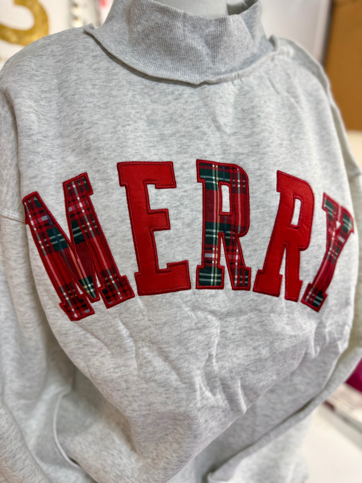 Merry Embroidered Mockneck