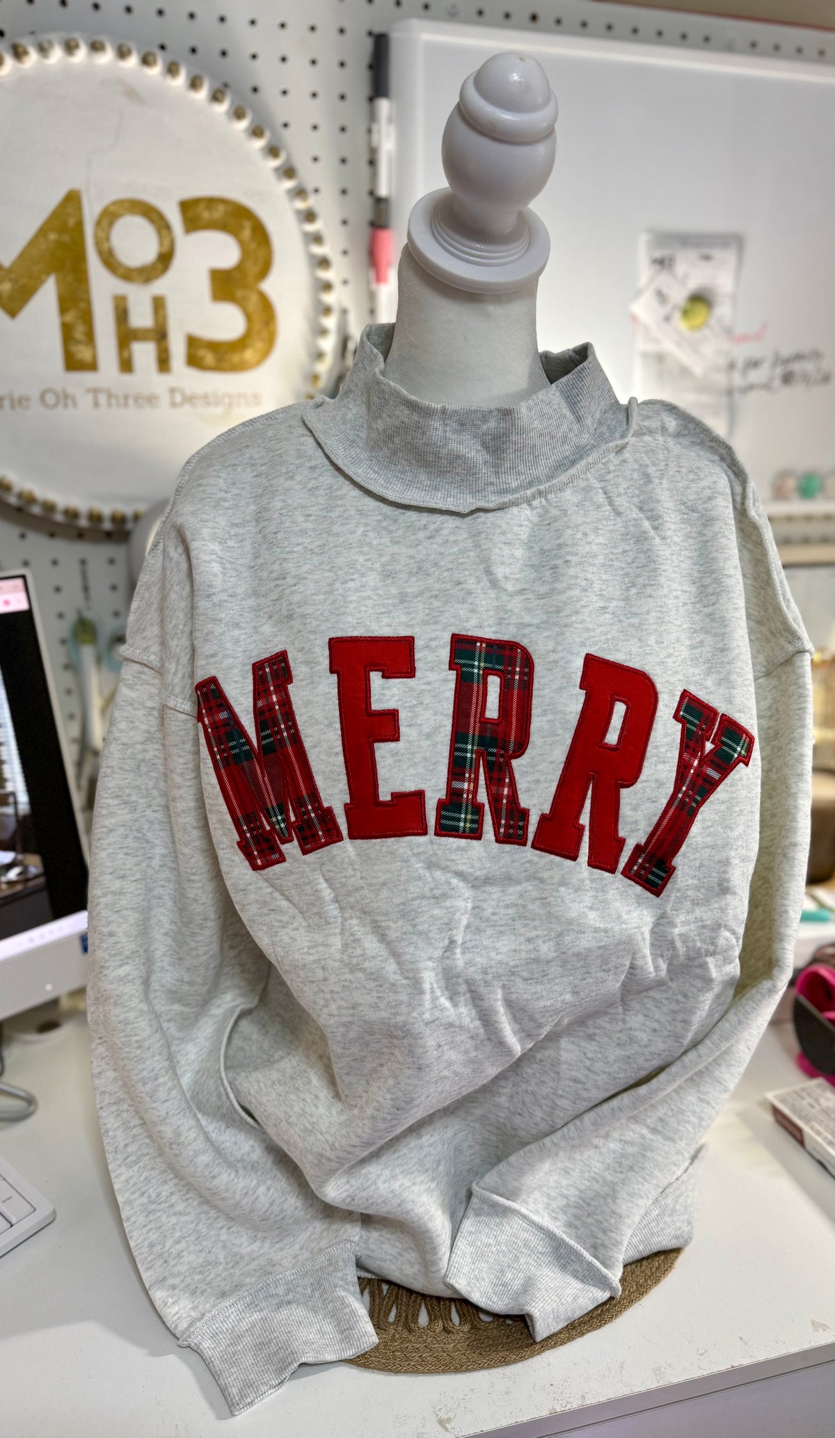 Merry Embroidered Mockneck